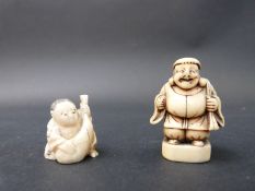 A Japanese Meiji period carved ivory netsuke of a man carrying a sack and an okimono of a child