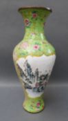 Chinese enamel vase decorated with birds and flowers on a green ground, 34cm tall,