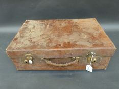 A vintage crocodile effect leather suitcase,