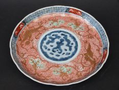 A Chinese plate in Imari colours decorated with birds in gilt 22.