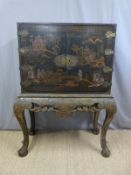 A 19th century Japanese laquer cabinet with fitted interior,