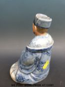 A 19thC Chinese blue and white figure of a scholar,