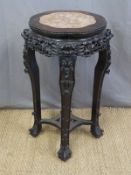 A 19th century Chinese carved padauk wood marble inset jardinere stand,