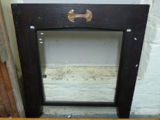A large chimney piece/fireplace or frame,