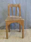 A rustic/folk art child's/doll's chair,