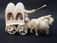 Early 20thC carved Indian ivory four wheel carriage towed by two oxen,