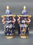A pair of Chinese lidded vases decorated in gilt and enamels with butterflies and dragonflies and