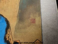 A Chinese scroll picture depicting a colourful mountainous scene,