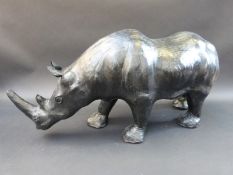 A leather Liberty style rhino footstool,