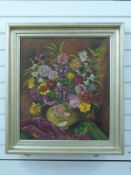 Oil on canvas, still life of flowers, indistinctly signed possibly Guiner,