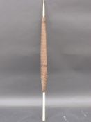 An early 20th C parasol the carved ivory handle with monkeys and signed,