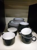 A quantity of retro Poole dinner and teaware
