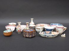 A collection of Chinese ceramics including cups, saucers, tea bowls,