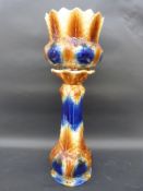 A majolica jardiniere and stand,