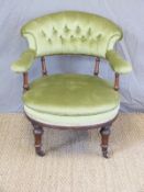 A 19thC upholstered armchair