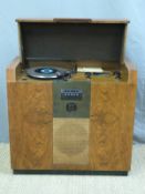 An Art Deco style walnut Ekco radiogram with bakelite fittings,
