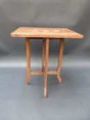 A rosewood folding table inlaid with ivory elephants in a desert setting (W38 x D30 x H45cm)