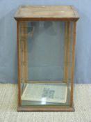 A glazed oak display cabinet,