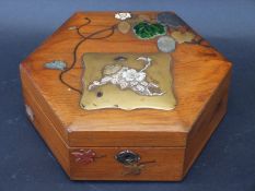 A Japanese hexagonal Shibayama box with inlaid decoration,