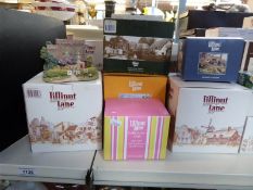 A large collection of Lilliput Lane cottages