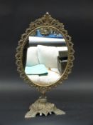 A gilt metal/brass framed swing frame mirror,