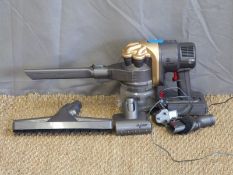 A hand held Dyson DC 16 animal vacuum cleaner
