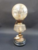 A brass and glass oil lamp with cut bowl and engraved shade, converted to electricity,
