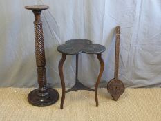 A 19thC carved mahogany trefoil table with shamrock design, probably Irish,