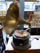 A wind up gramophone with brass horn
