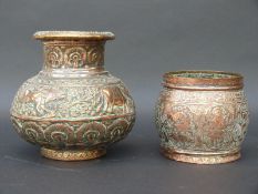 Two 19th century Indian embossed copper vases,