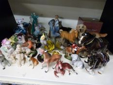 A collection of animals, birds etc to include Coopercraft, Anglia Pottery, Trenthamware Devon,