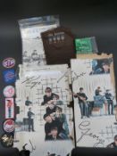Beatles related ephemera to include a pair of silk embroidered stockings,