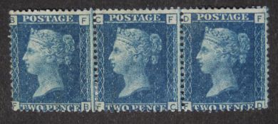 A strip of three 1858 2d blue mint stamps,