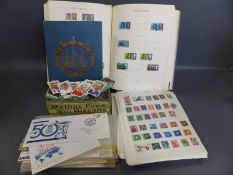 A collection of stamps in albums and loose including a Windsor Great Britain album,