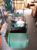 A Qualcast Classic petrol 43 cylinder mower with grass box