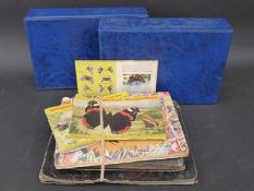 Three various albums of cigarette cards, a stamp album etc.