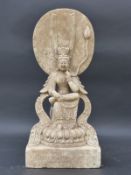 A Chinese carved stone figure Guanyin,
