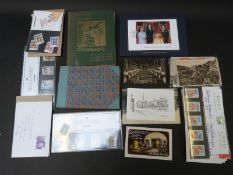 A quantity of stamps including first day covers & presentation packs in an album,