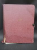 A folio of approximately 35 mounted photographs, most signed either J.E.