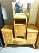 A retro Homeworthy bedroom suite, two wardrobes,