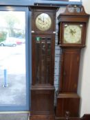 A late 19th / early 20thC longcase clock with bevelled glass door,