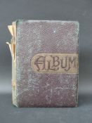 An Edwardian postcard album of UK topographical postcards including Scotland, Devon, Jersey,