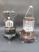 A KSM 'Moonlighter' Kero-Sun paraffin heater, together with a black enamelled Valor vintage example,