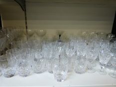 A large collection of glass including some sets of cut glass.