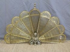 A brass fan firescreen and one other
