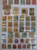 A stock album containing stamps from Japan, Siam (Thailand), Macau and China, mint and used,