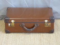 A vintage leather bound case,