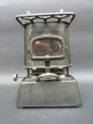 An Albion Lamp Company cast iron miniature kettle stove,