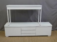 A white modern dresser, length 180cm, and matching desk,