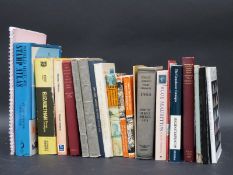 A box of stamp reference books and catalogues including Postal History